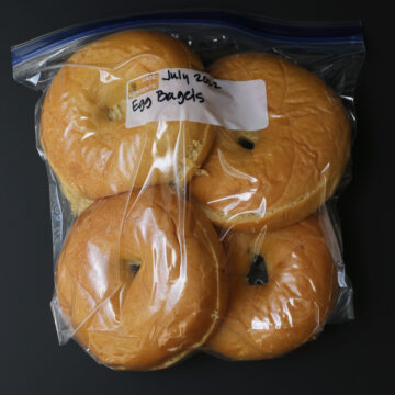 four bagels in freezer bag with air removed.