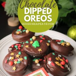 christmas chocolate dipped oreos on a plate with trees in background, and text overlay.