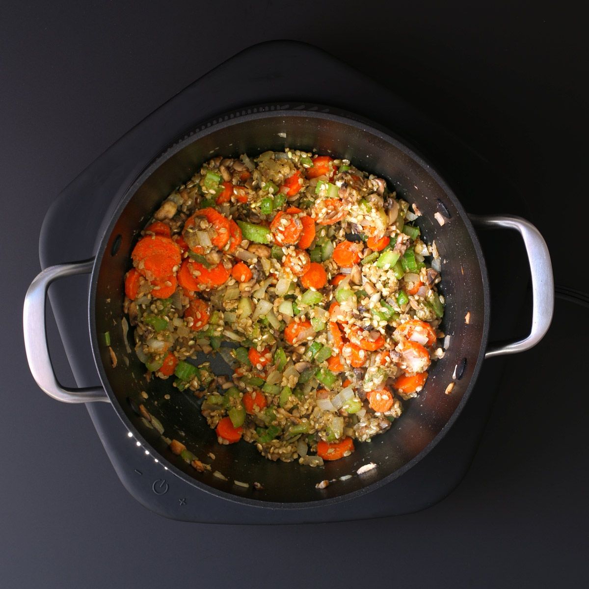 cooking until the roux is formed with the veggies in the pot.