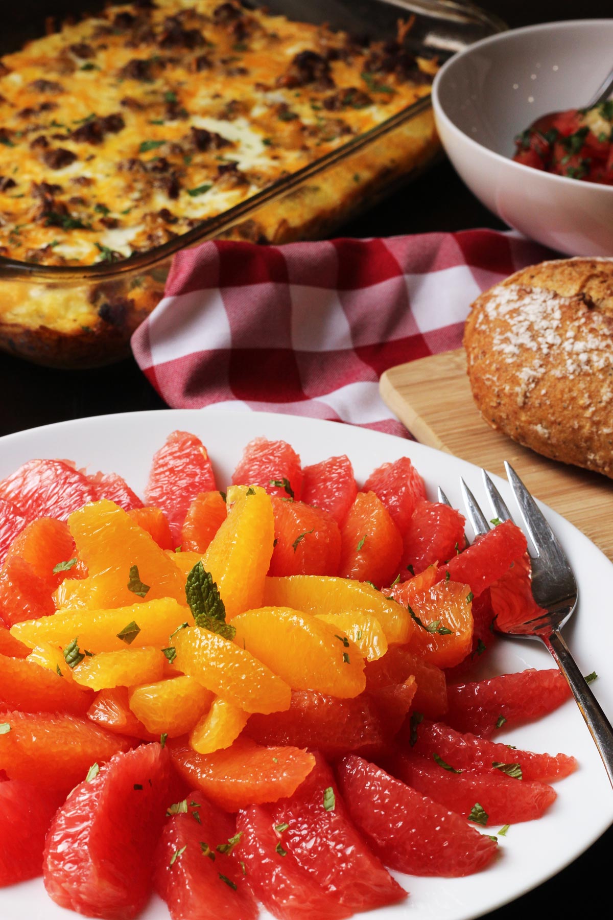 platter of citrus supremes on brunch table.