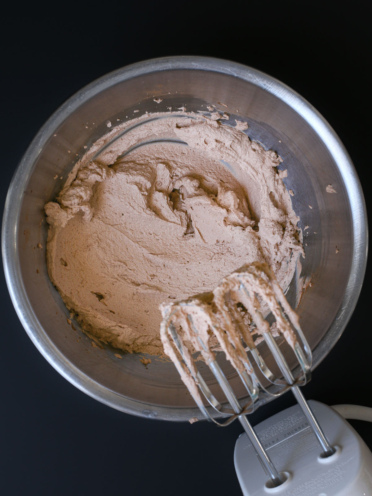 chocolate whipped cream with a mixing bowl and beaters.