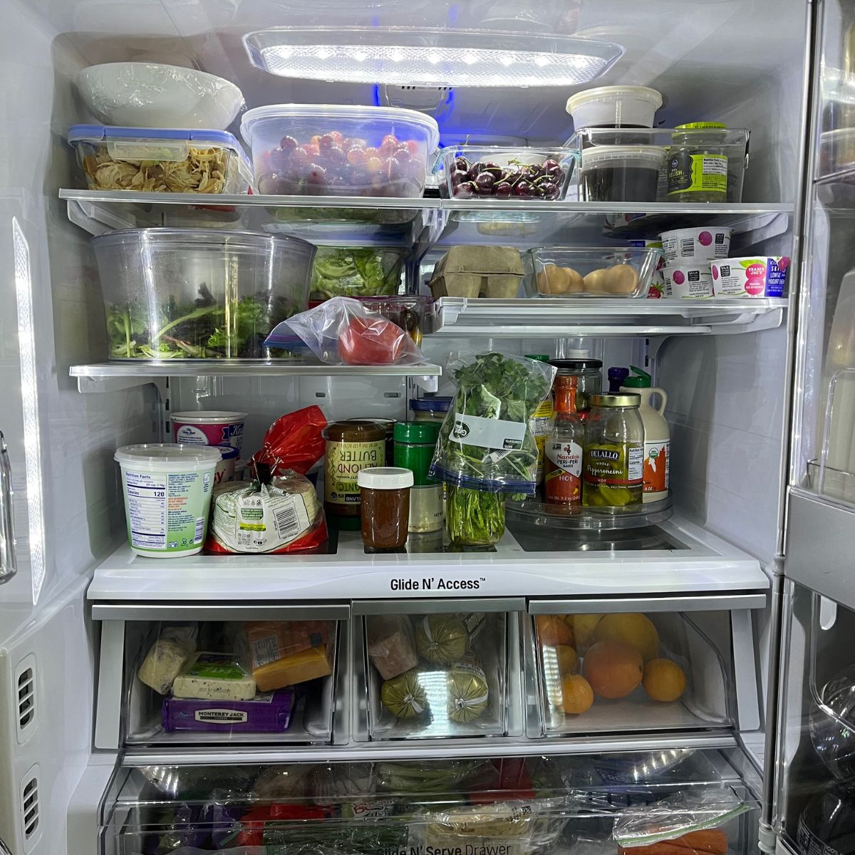 view of clean and tidy double door refrigerator.