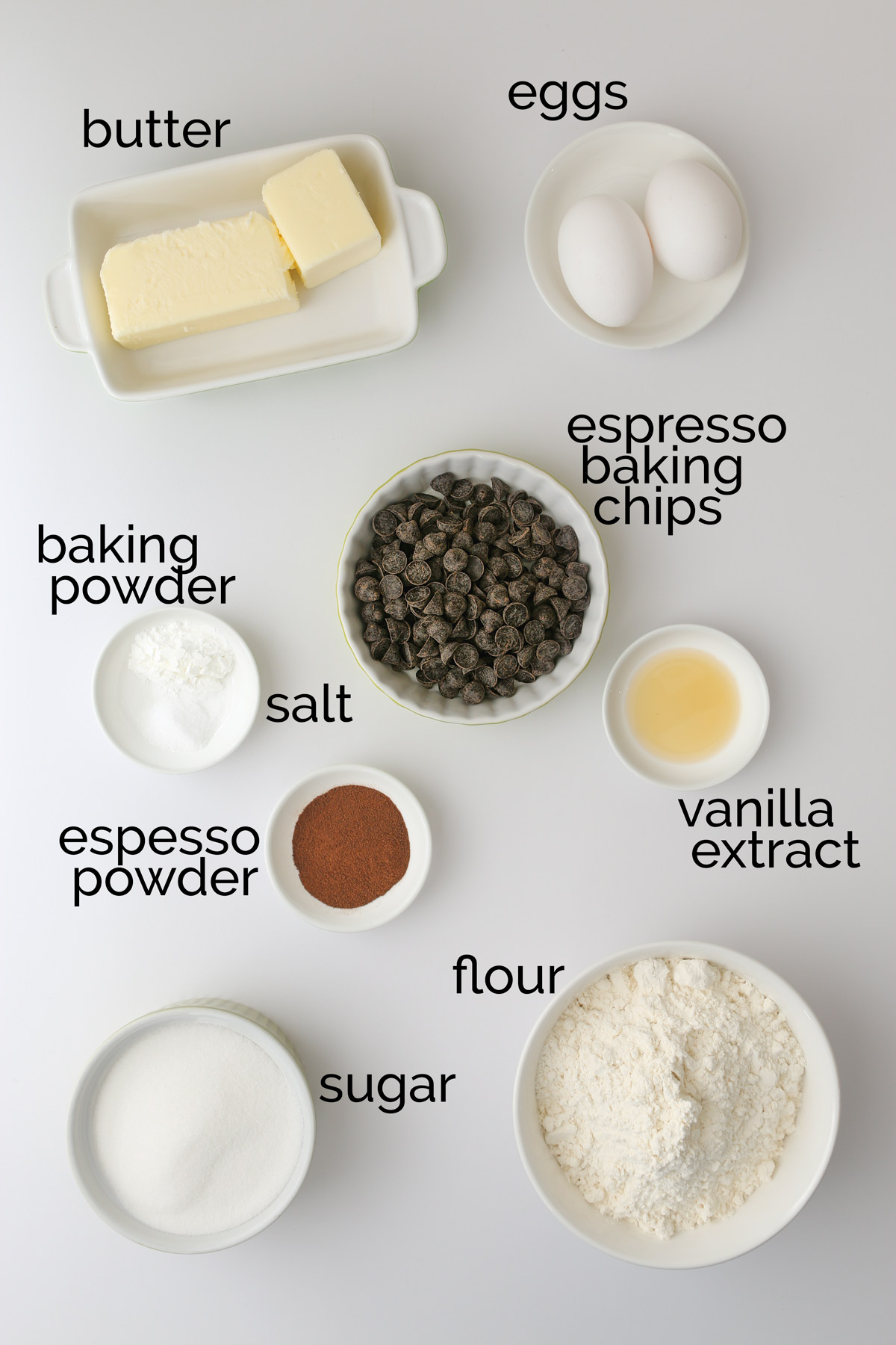 ingredients for coffee cookies laid out on white counter.