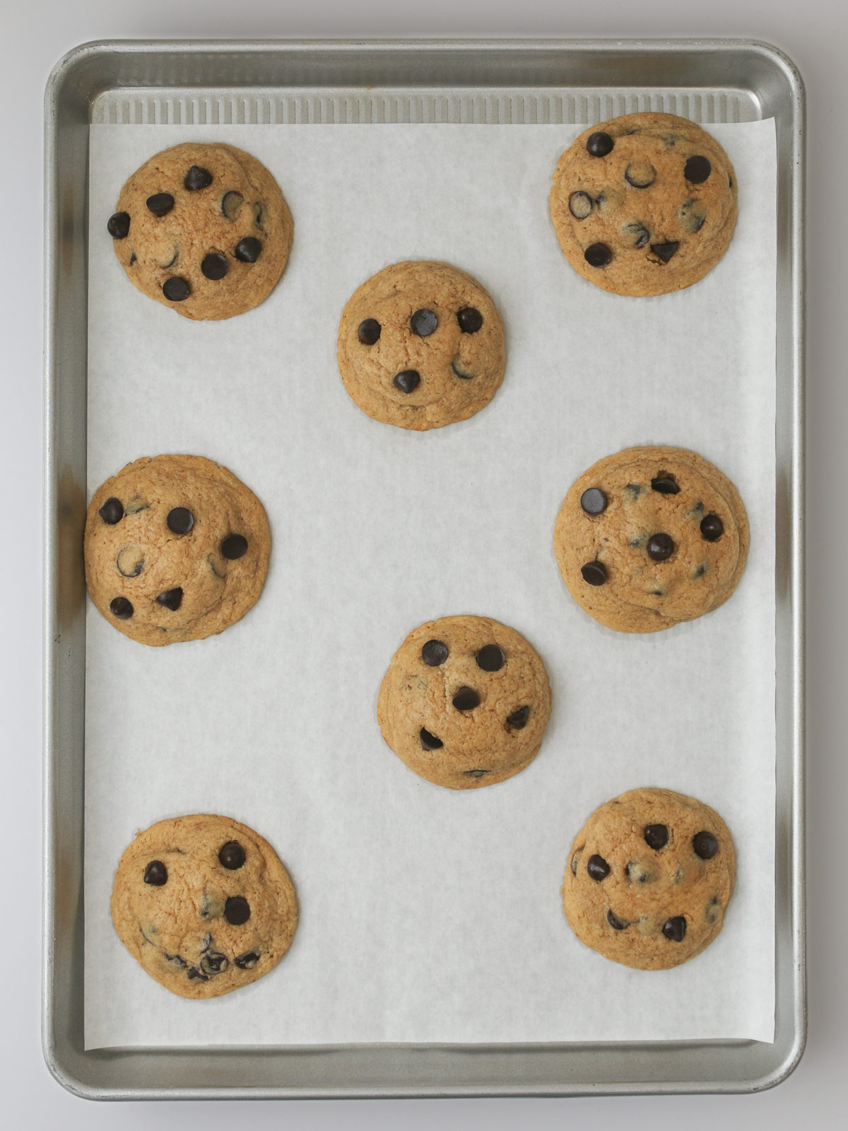 baked cookies on lined sheet.