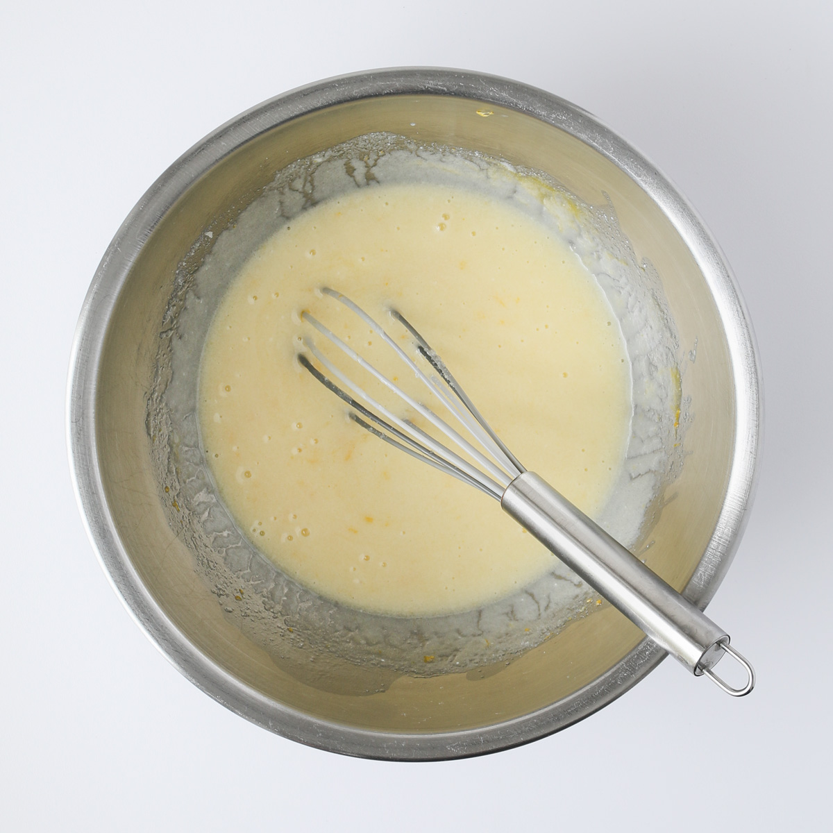wet ingredients completely combined in mixing bowl, with whisk.