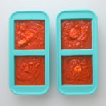 spaghetti sauce in souper cubes to be frozen for later.