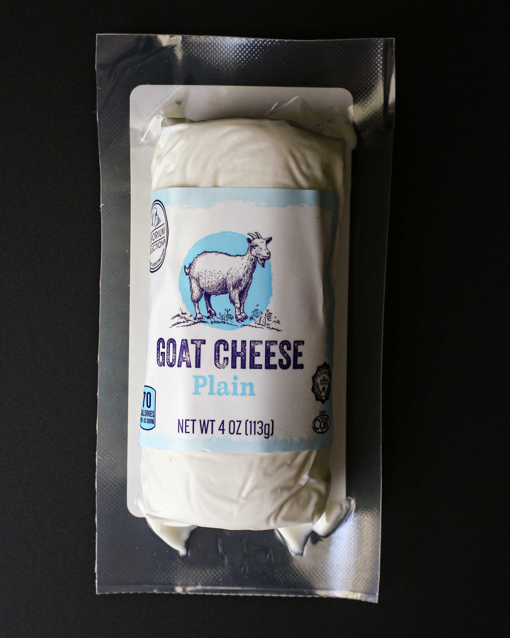 goat cheese from ALDI in its original packaging on black counter.