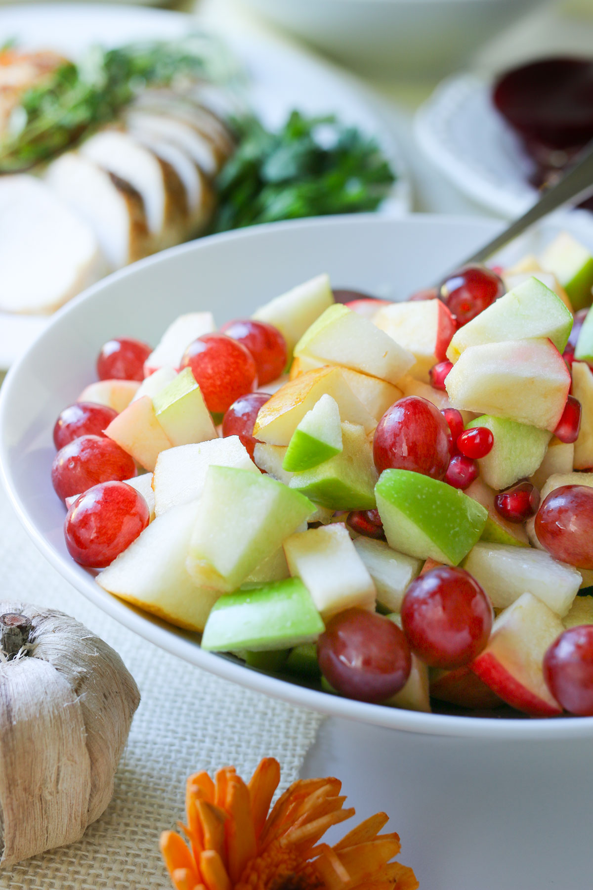 side view of a bowl of fruit salad.