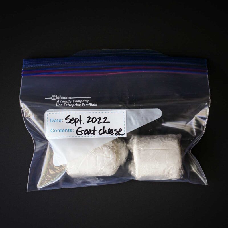 chunks of goat cheese packaged for freezing.