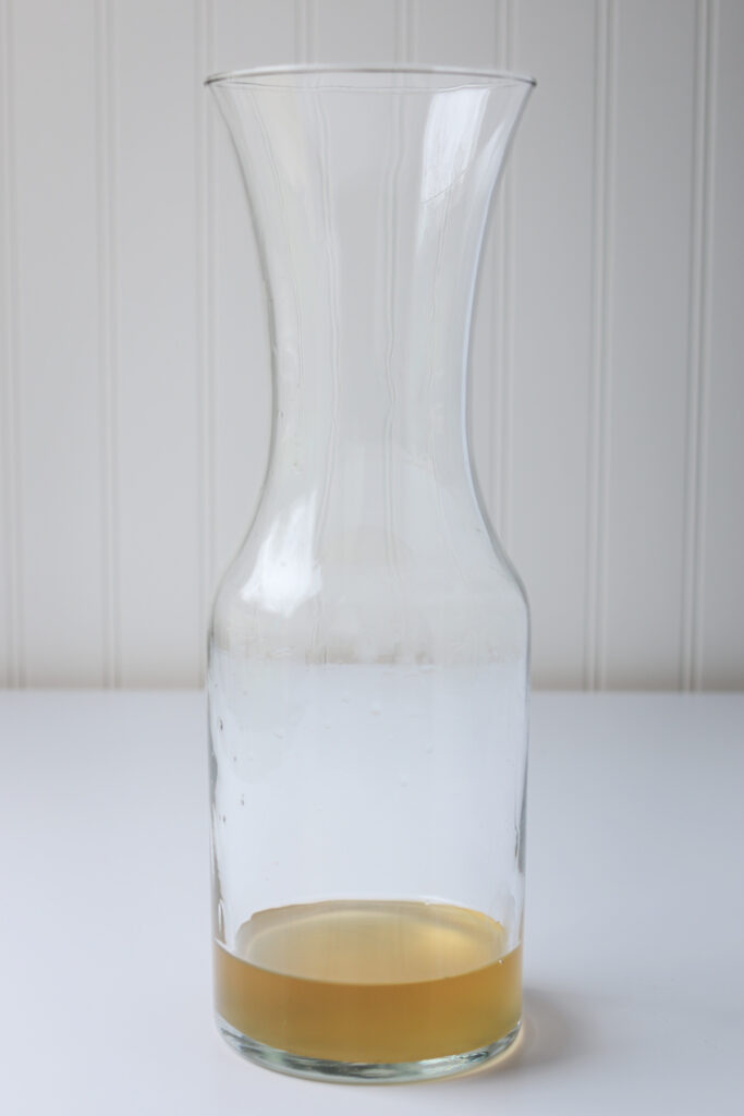 ginger syrup in bottom of carafe.