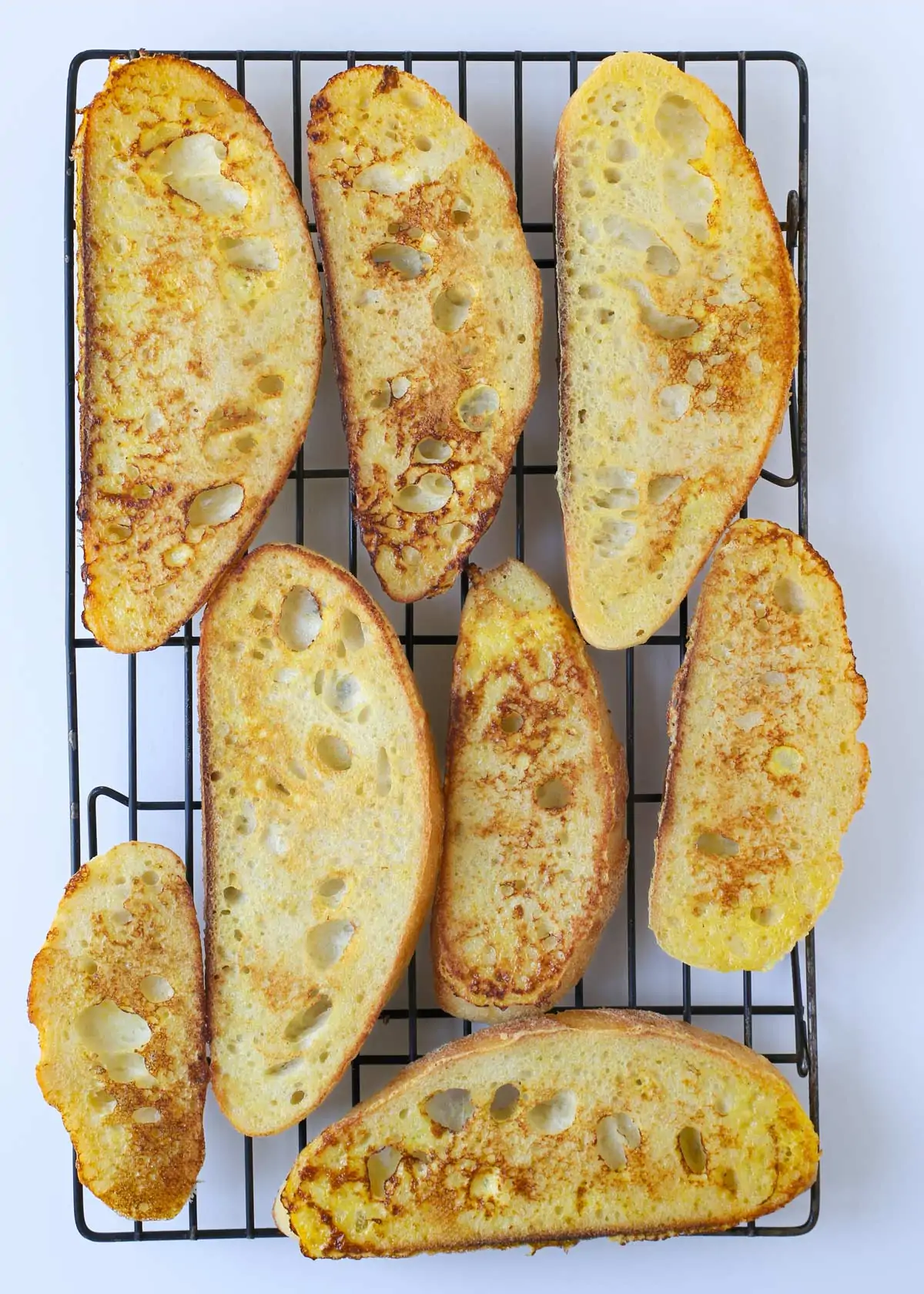 french toast cooling on a rack.