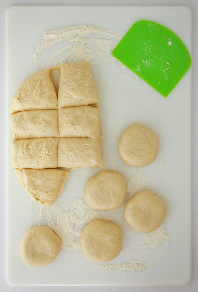 dough cut into portions and formed into rolls.