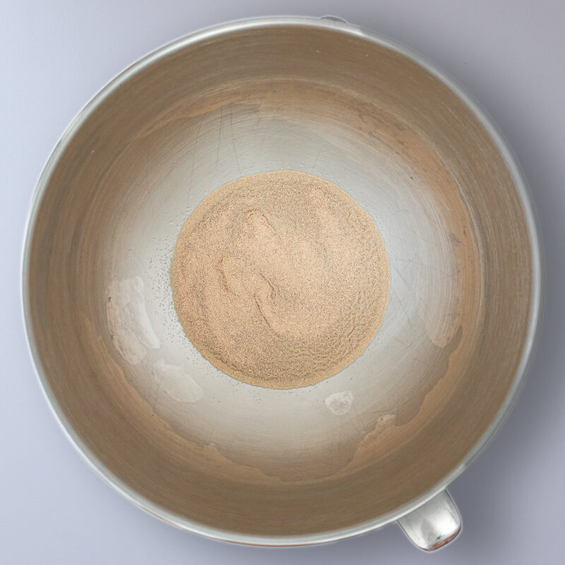 yeast dissolved in water in mixing bowl.