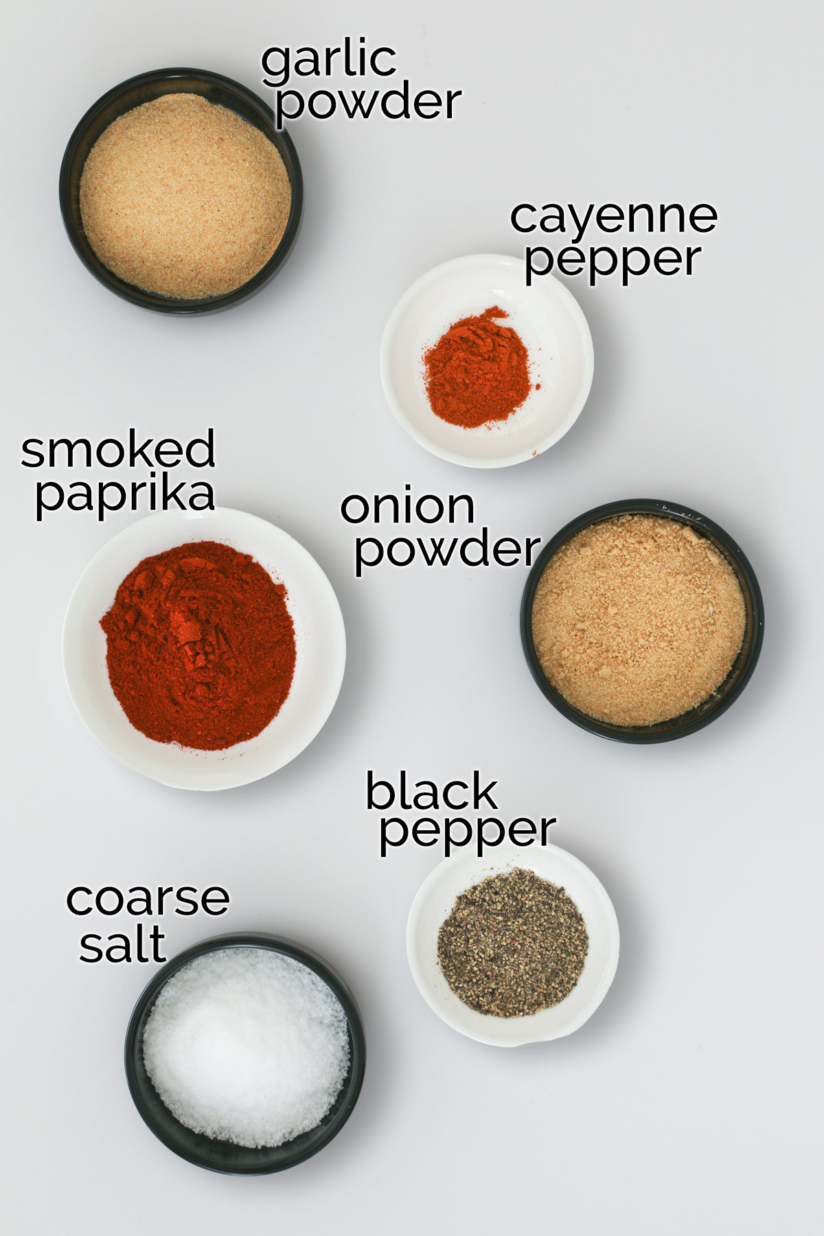 ingredients for hamburger seasoning laid out on a table.