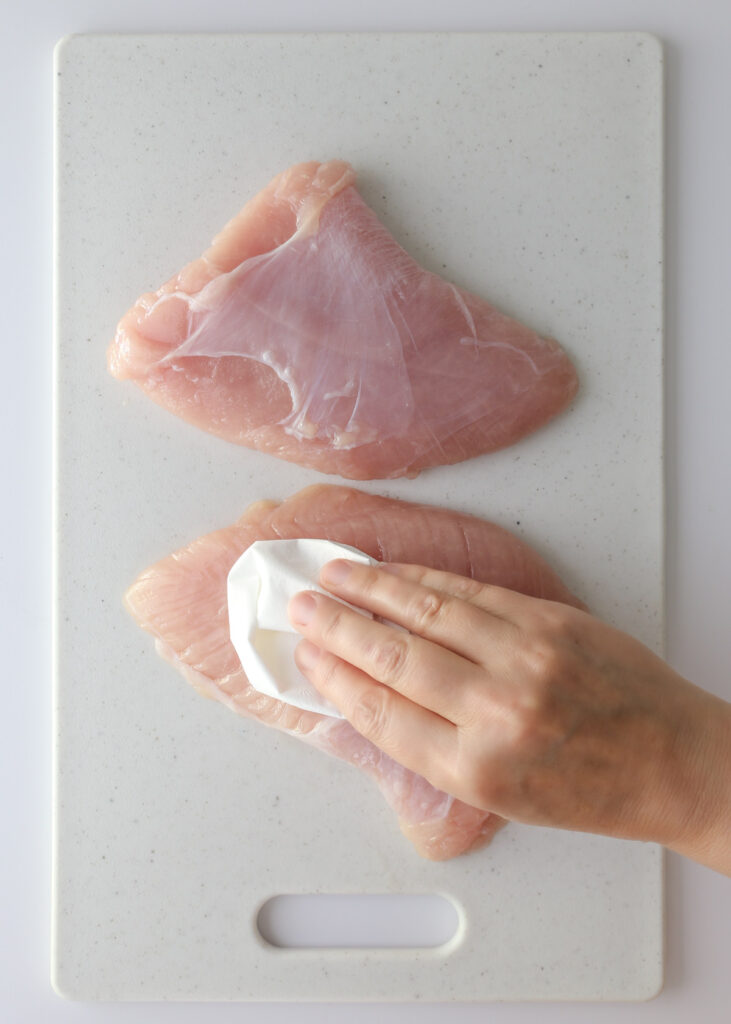 patting the tenderloins dry with a paper towel.