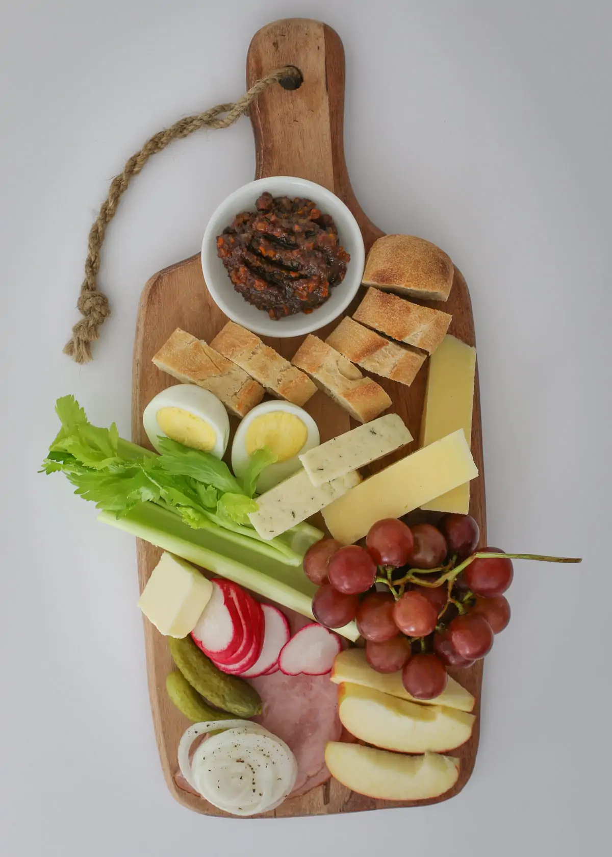 overhead shot of a ploughman's lunch, complete with homemade pickle.