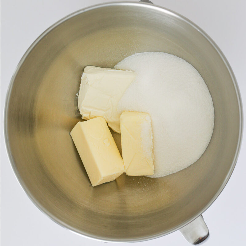 butter, sugar, and cream cheese in stand mixer bowl.