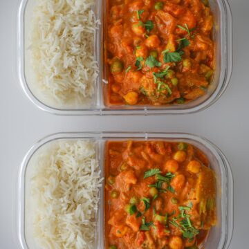 meal prep dishes full of veggie curry.