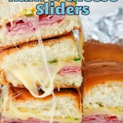 stack of hot ham and swiss sliders, with text overlay.