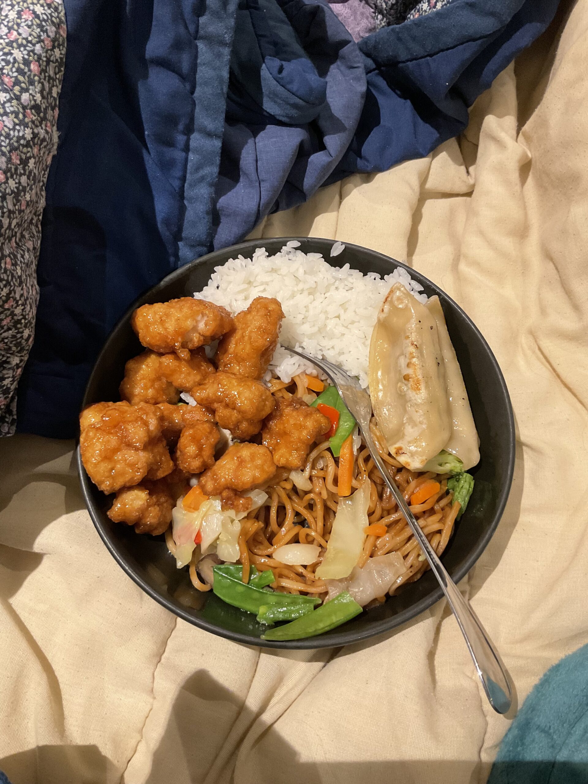 Asian bowl in bed.
