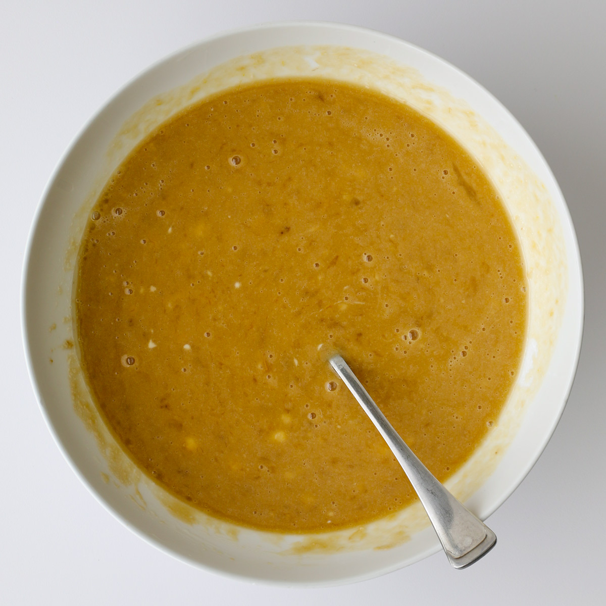 white bowl of wet ingredients.