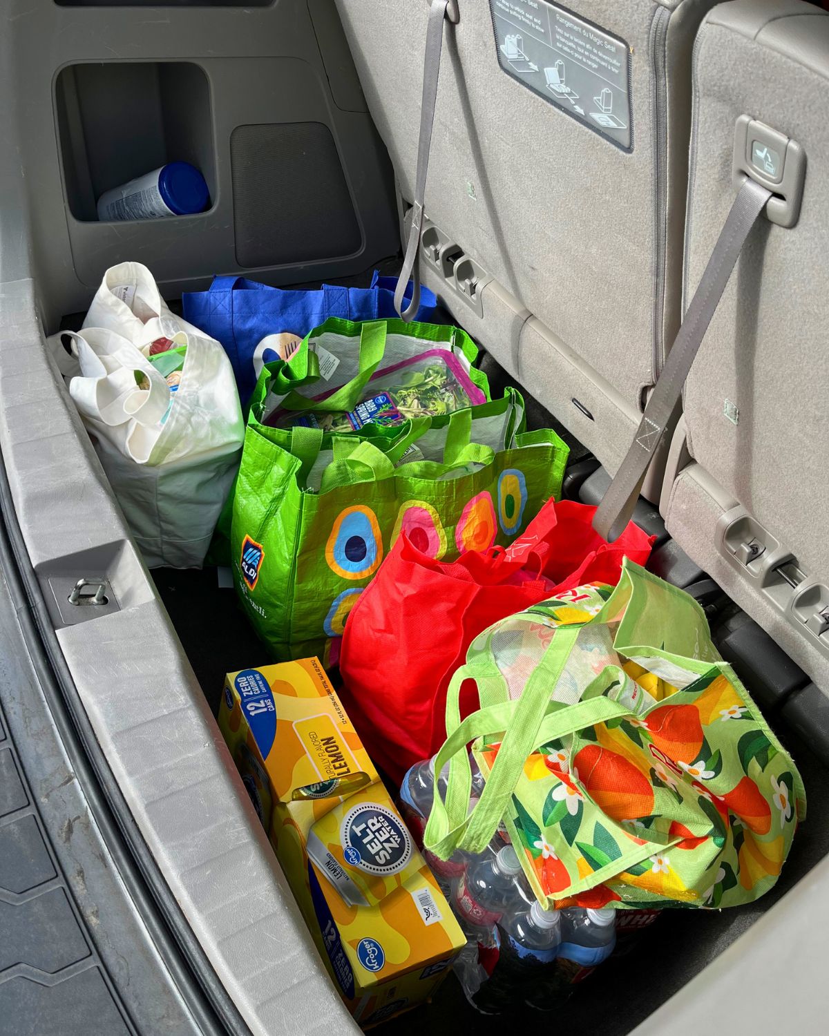 grocery bags in back of van.