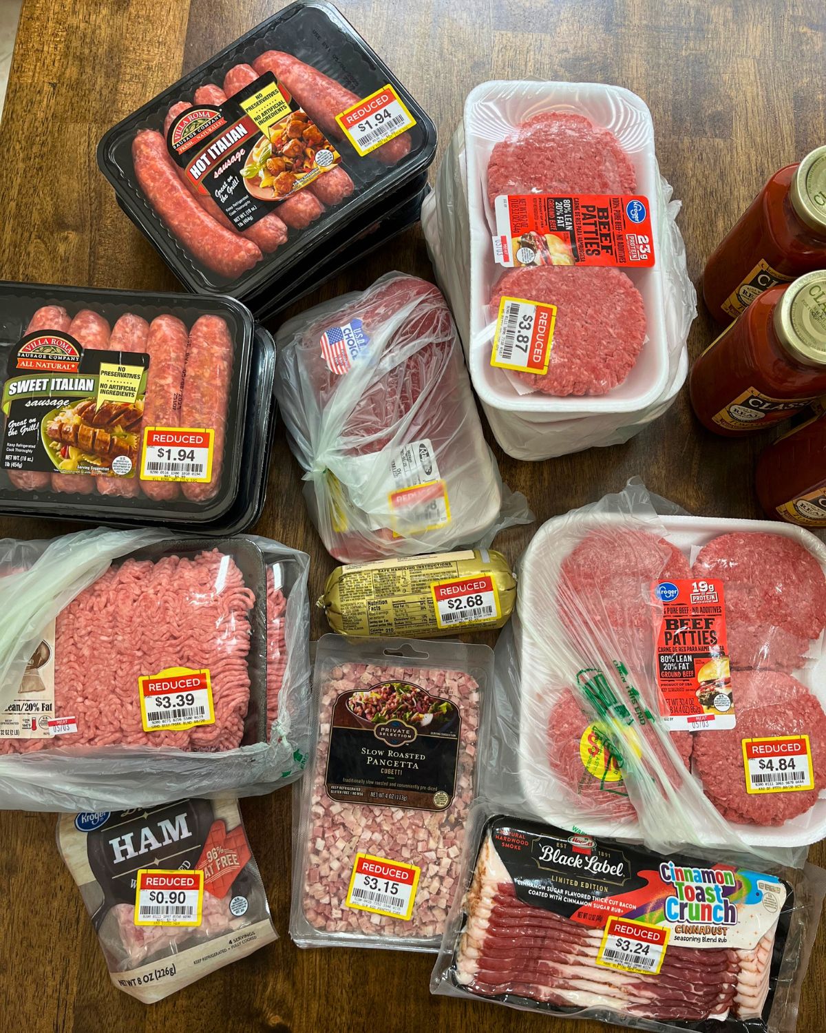 meat markdowns from ralphs laid out on table.