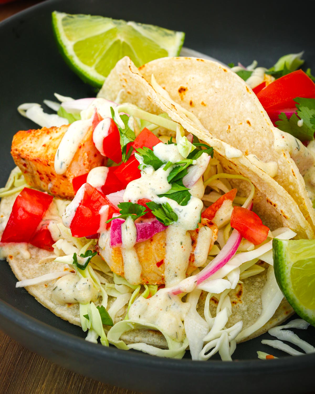 mahi mahi taco made on a corn tortilla.