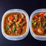 beef stew in meal prep boxes.