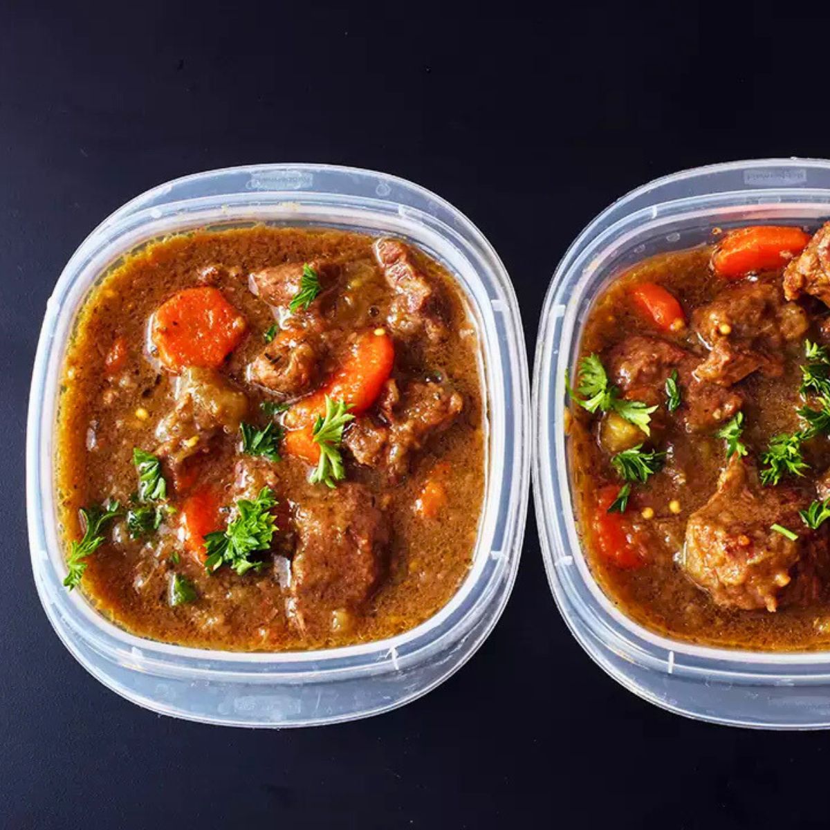 beef stew in meal prep boxes.