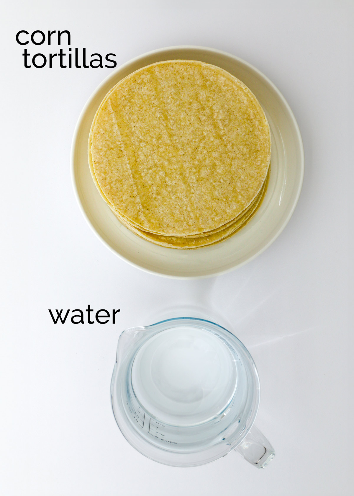corn tortillas and a carafe of water.