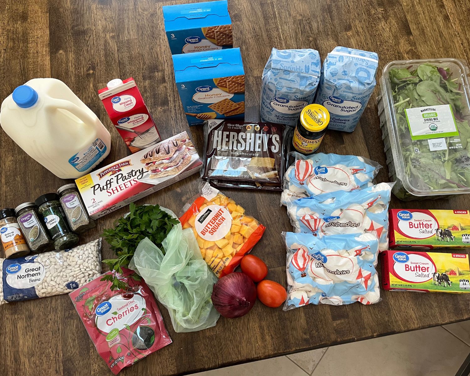 array of groceries from Walmart laid on table.