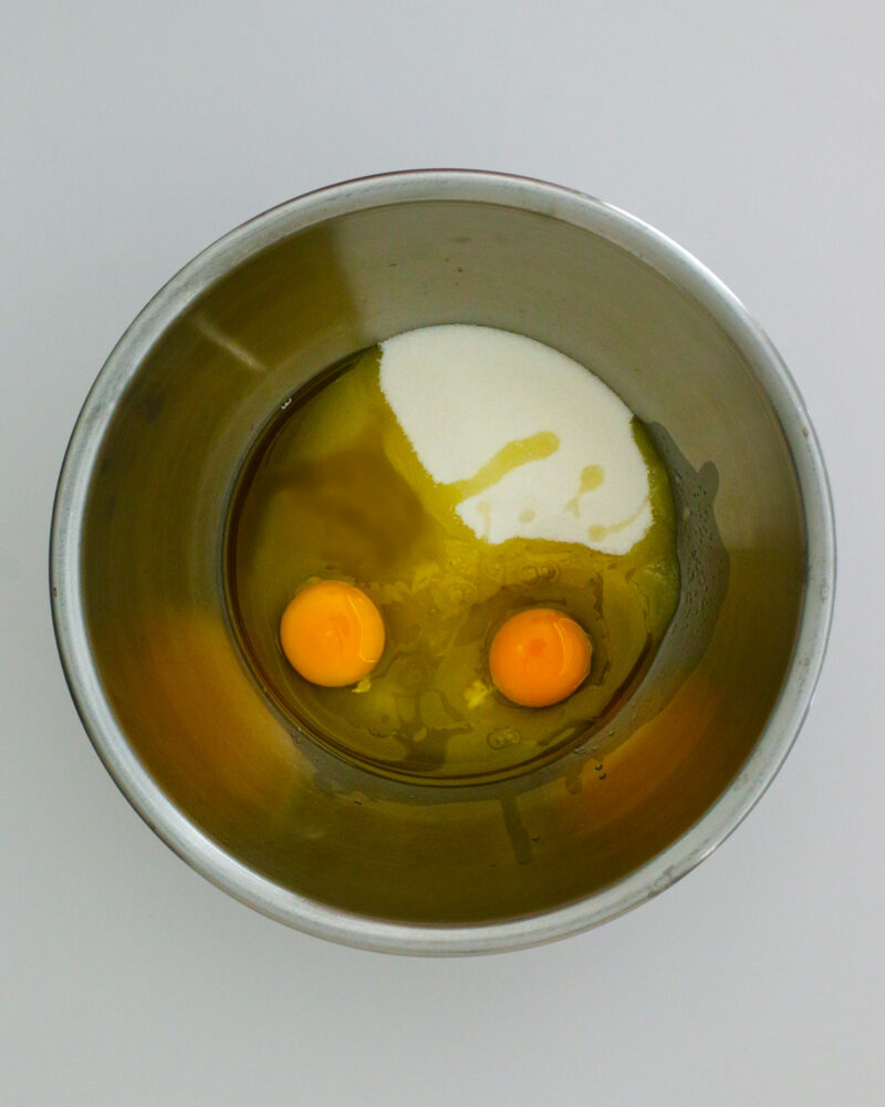 eggs, sugar, and oil in mixing bowl.