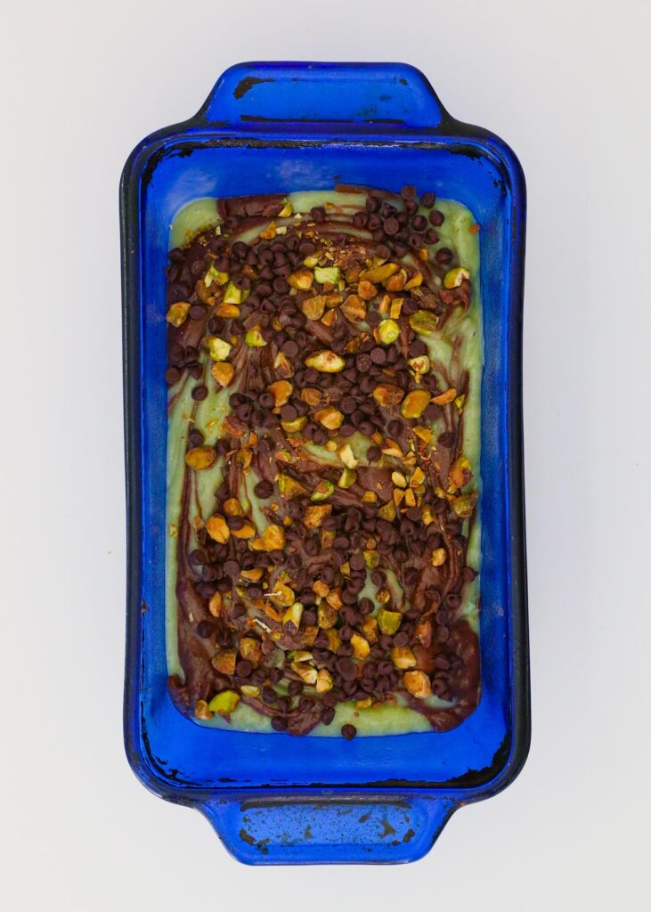 the chocolate chips and nuts added to the loaf pan.